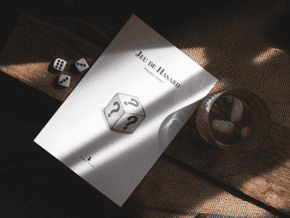 Jeu de Hasard par Frédéric Perrin, un tour de magie avec un dé à questions pour surprendre.