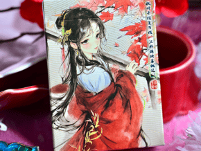 Jeu de cartes de magie japonaise avec illustration artistique.