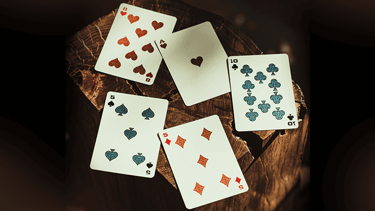 Jeu de cartes Gunslingers Poker bleu avec motifs de revolver et symboles de poker.